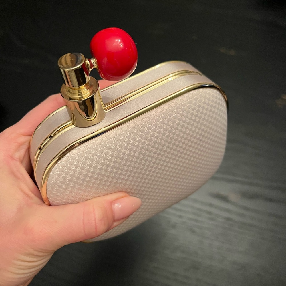 Elegant Perfume Bottle Clutch with Gold Accents